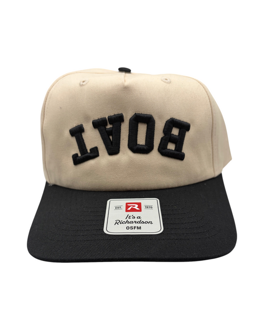 Blink Supply Co cream and black baseball cap featuring upside down BOAT embroidery on the front panel