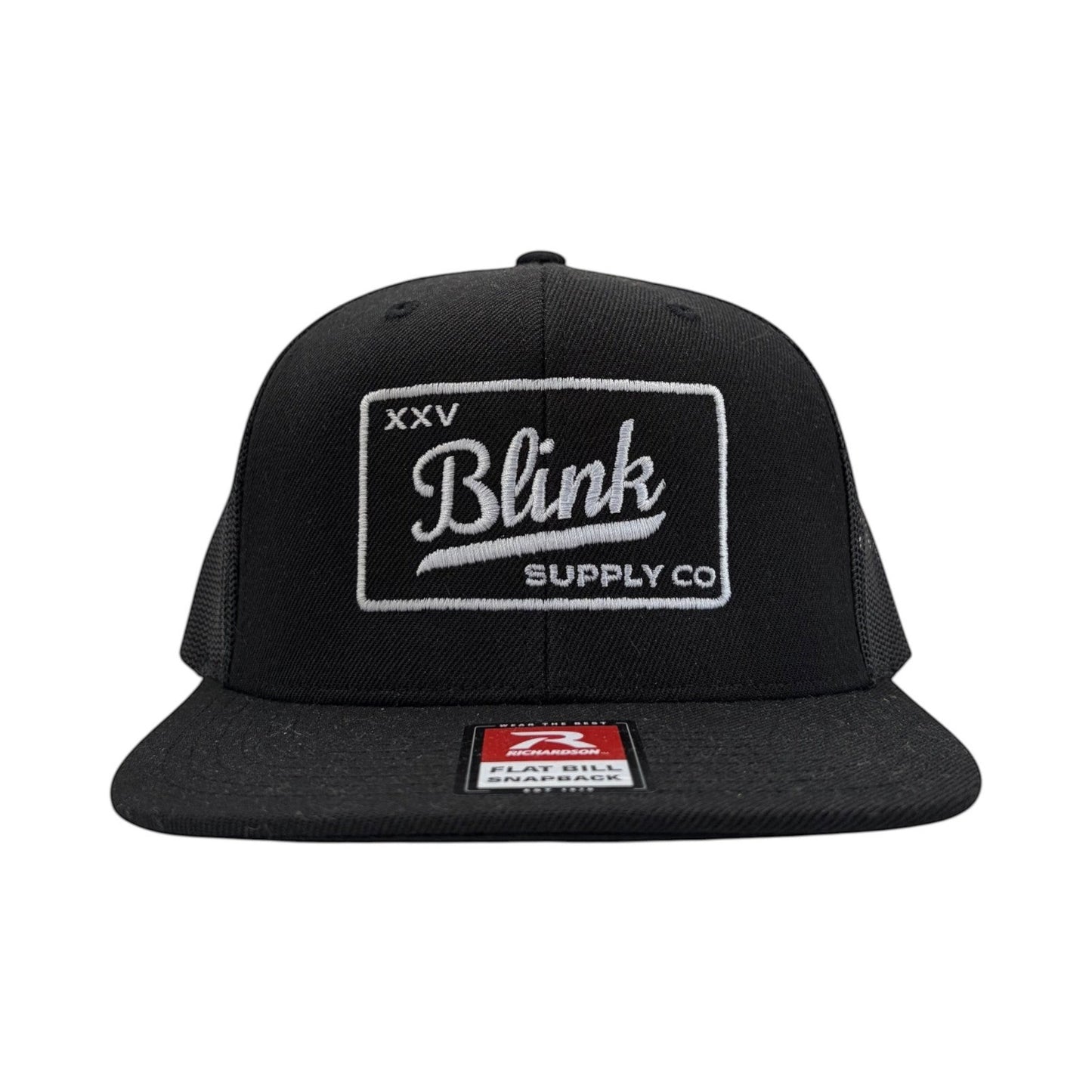 Blink Supply Co XXV flat bill trucker cap in black with white premium embroidery on a six-panel snapback design