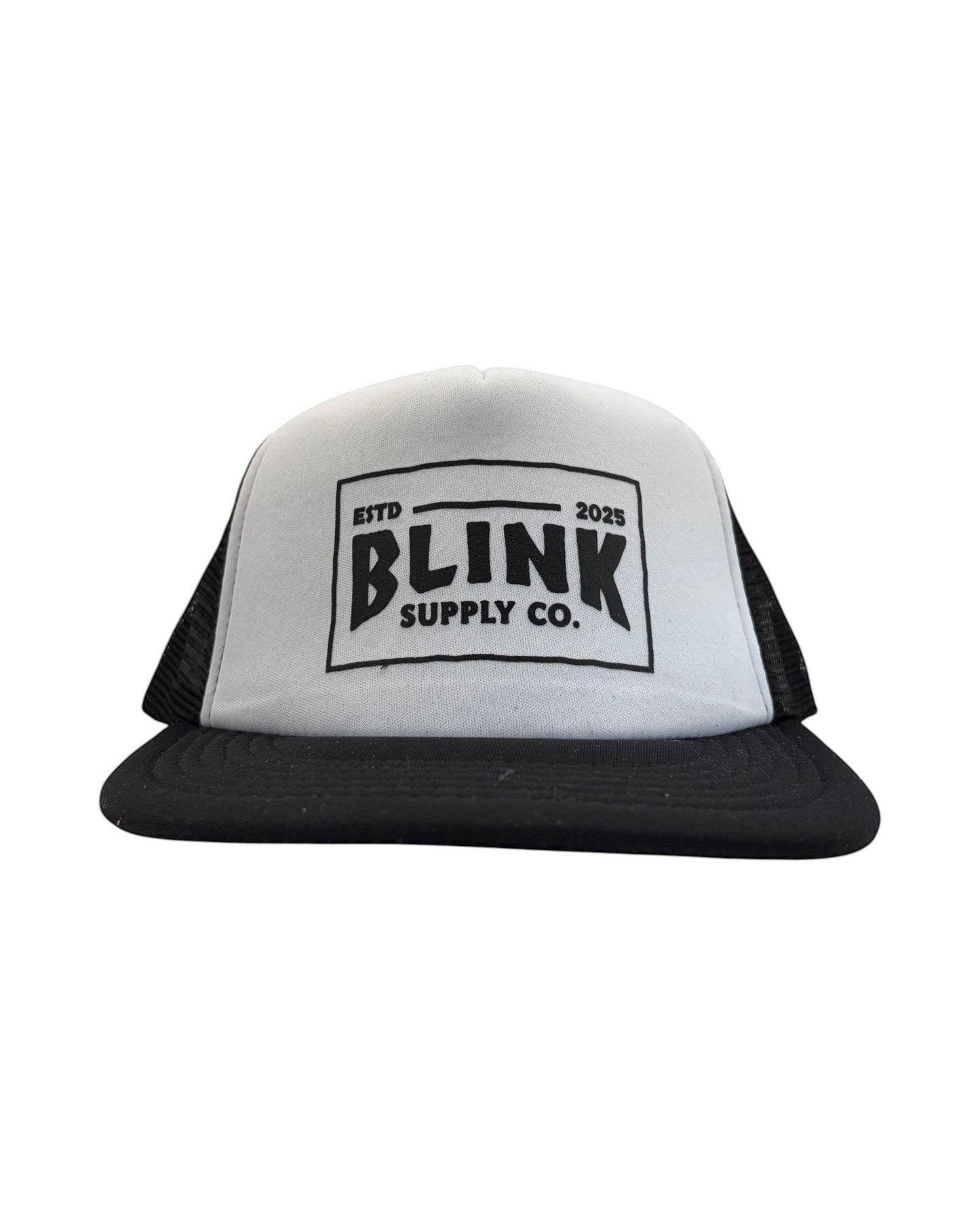 Blink Supply Co Chee-Pass low-profile trucker hat in white and black with a snapback closure and front logo print.