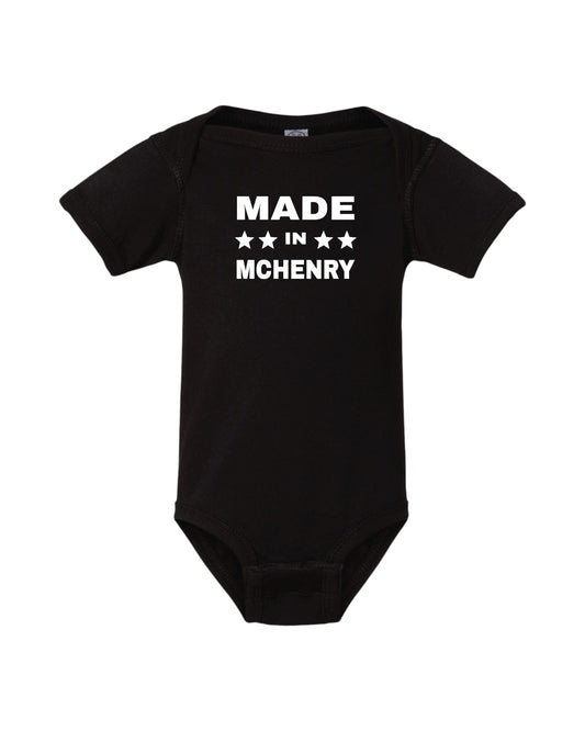 Blink Supply Co. black cotton onesie with white "MADE IN MCHENRY" text and three stars.