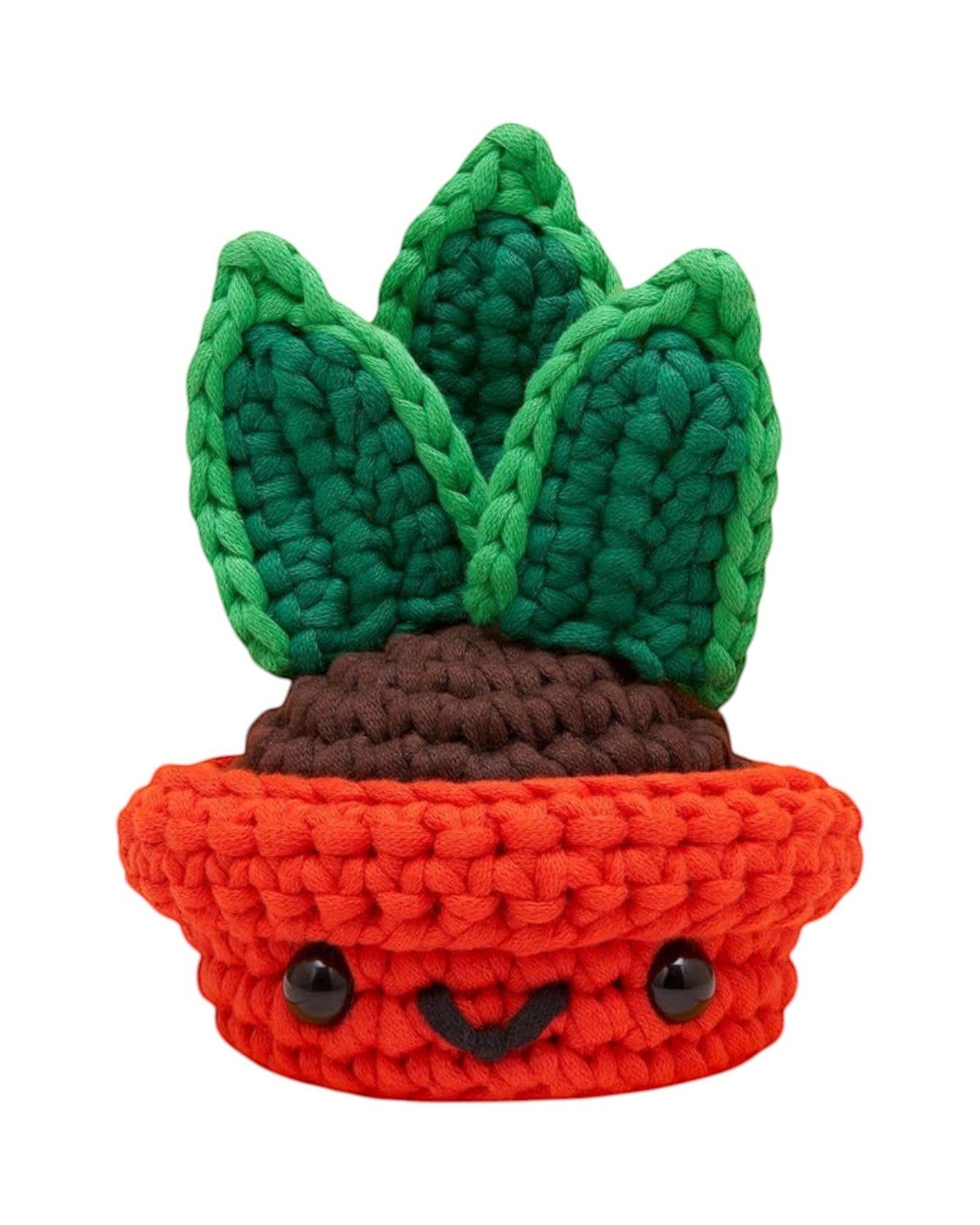 Blink Supply Co Otis the Snake Plant crochet kit with green leaves, brown soil, and orange pot with face.